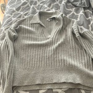 Grey sweater that is good for the winter. Size XL and has never been worn.
